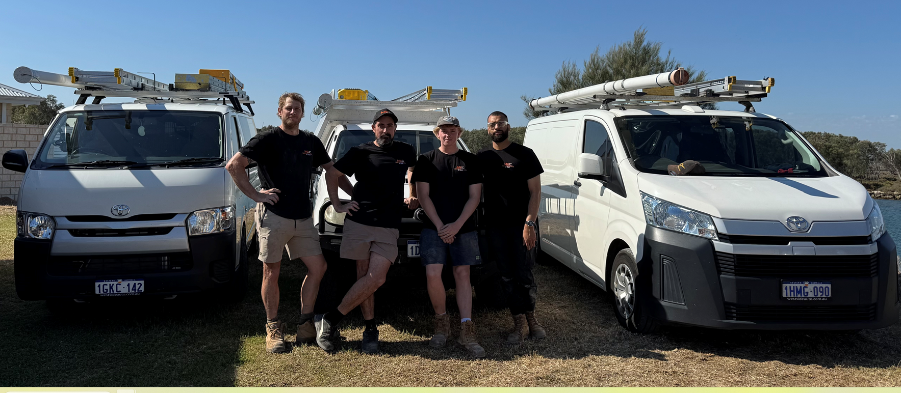 McGuires Electrical Contractors team with their fleet of service vans in Perth's southern suburbs